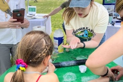 Jillian-teaching-kids-how-to-make-seed-bombs